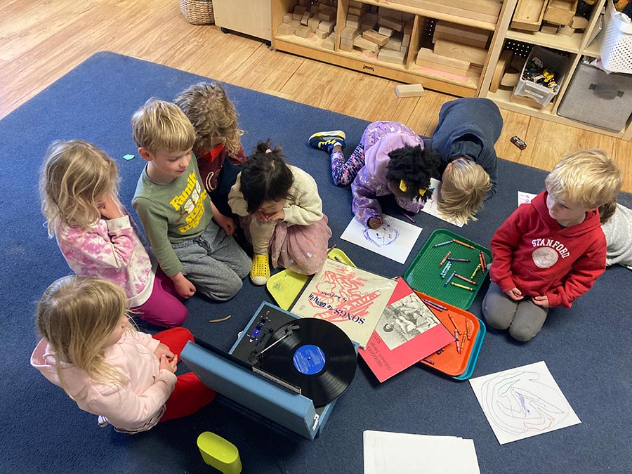 Elementary school children exploring Folkways records in the classroom. Photo by Greg Gardner.