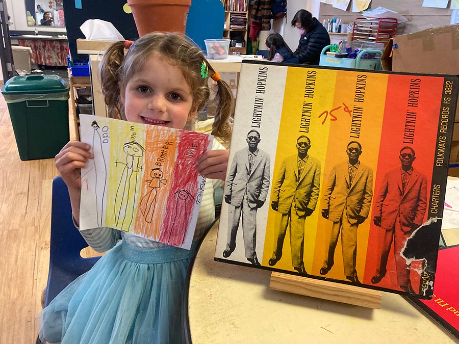 Elementary school children exploring Folkways records in the classroom. Photo by Greg Gardner.